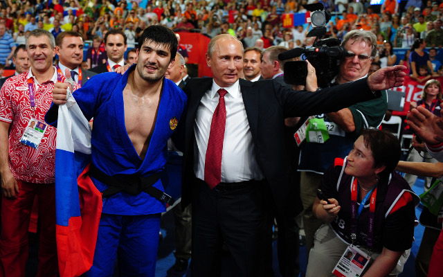 Black-belt Vladimir Putin wants wrestling to stay in Olympics
