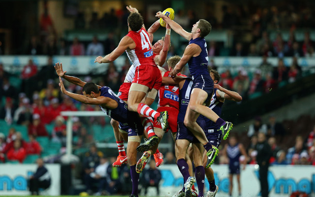 Sydney Swans and Fremantle fight out first draw of AFL season