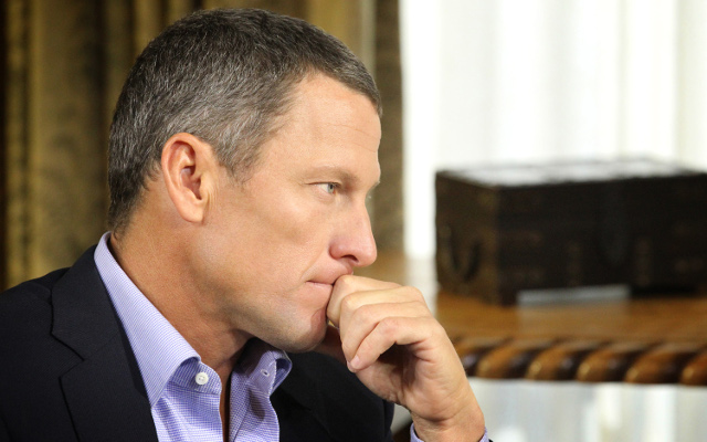 Disgraced cyclist Lance Armstrong hits parked cars, tries to put blame on girlfriend