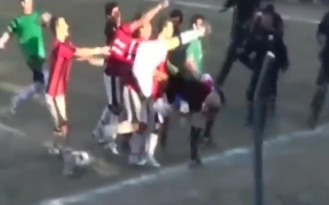 (Video) Madness from Paraguay as a furious player jump-kicks the referee in the face