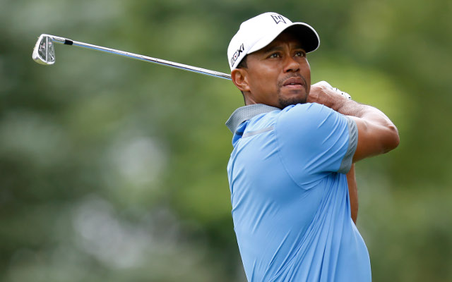 Tiger Woods cards 61 to lead World Golf Championships