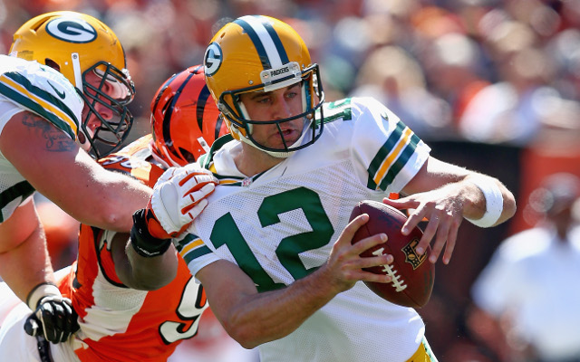 Green Bay Packers quarterback Aaron Rodgers remains sidelined