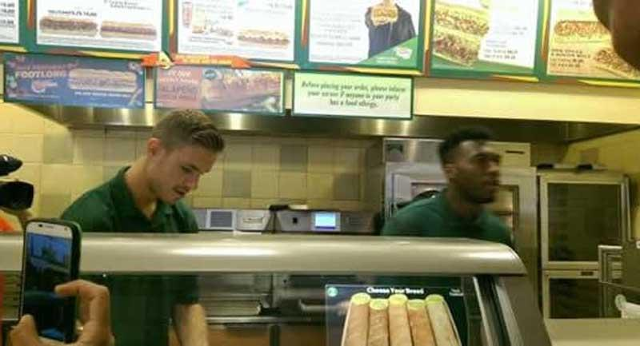 (Image) Liverpool stars Daniel Sturridge & Jordan Henderson work a shift in Subway