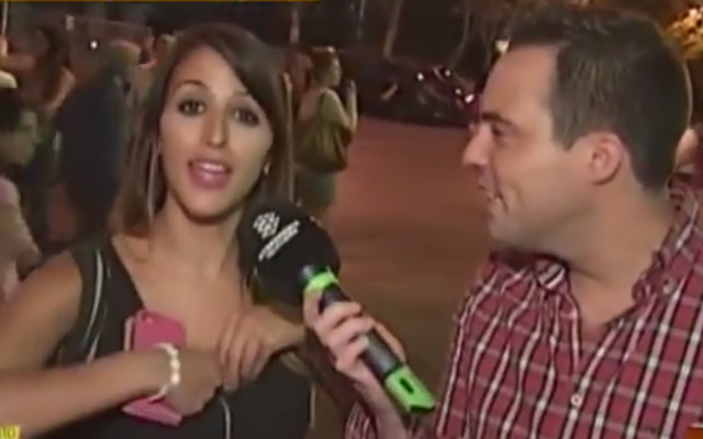 (Video) Spanish beauty shows support for Real Madrid’s Iker Casillas with cleavage message