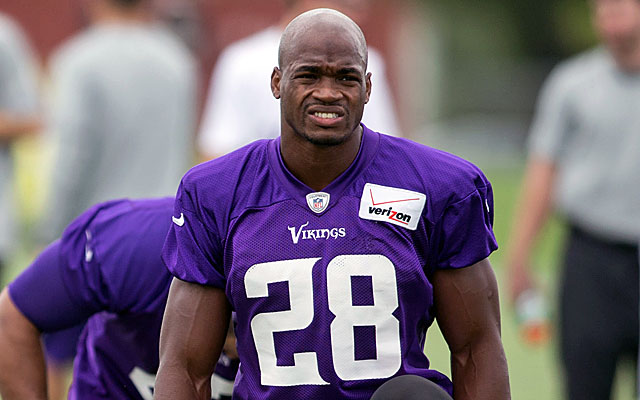 (Image) Minnesota Vikings head coach and GM hug Adrian Peterson in hopeful visit to convince him to return