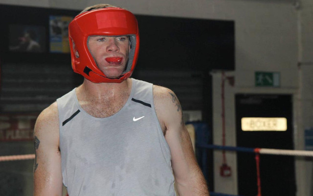 Man United’s Wayne Rooney KNOCKED OUT in boxing fight with former team-mate Phil Bardsley