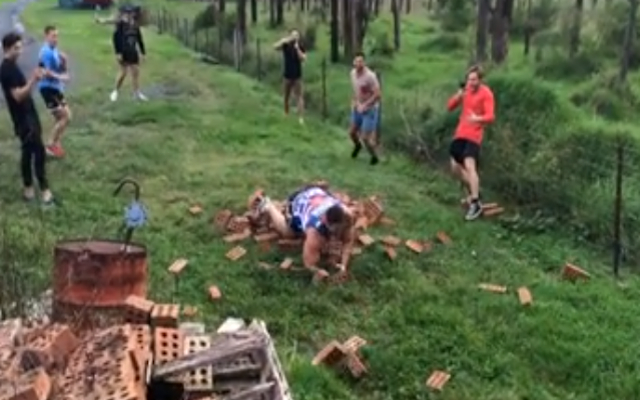 (Video) Australian teen David Andjelic crashes through wall of bricks in bid for NRL contract