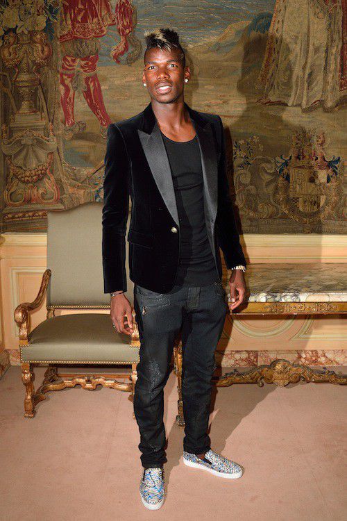 Football Players Paul Pogba and Karim Benzema attend the Balmain